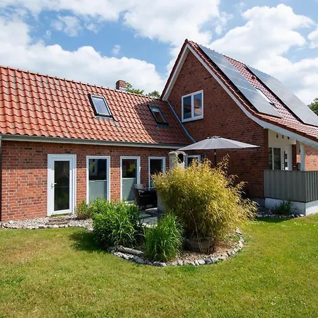 Huus Strandgut Casa de Férias *