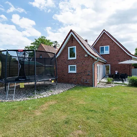 Huus Strandgut Casa de Férias *