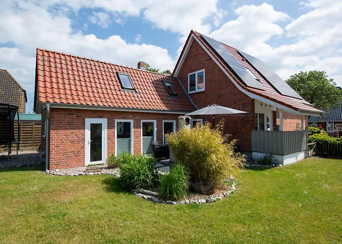 Huus Strandgut Casa de Férias *